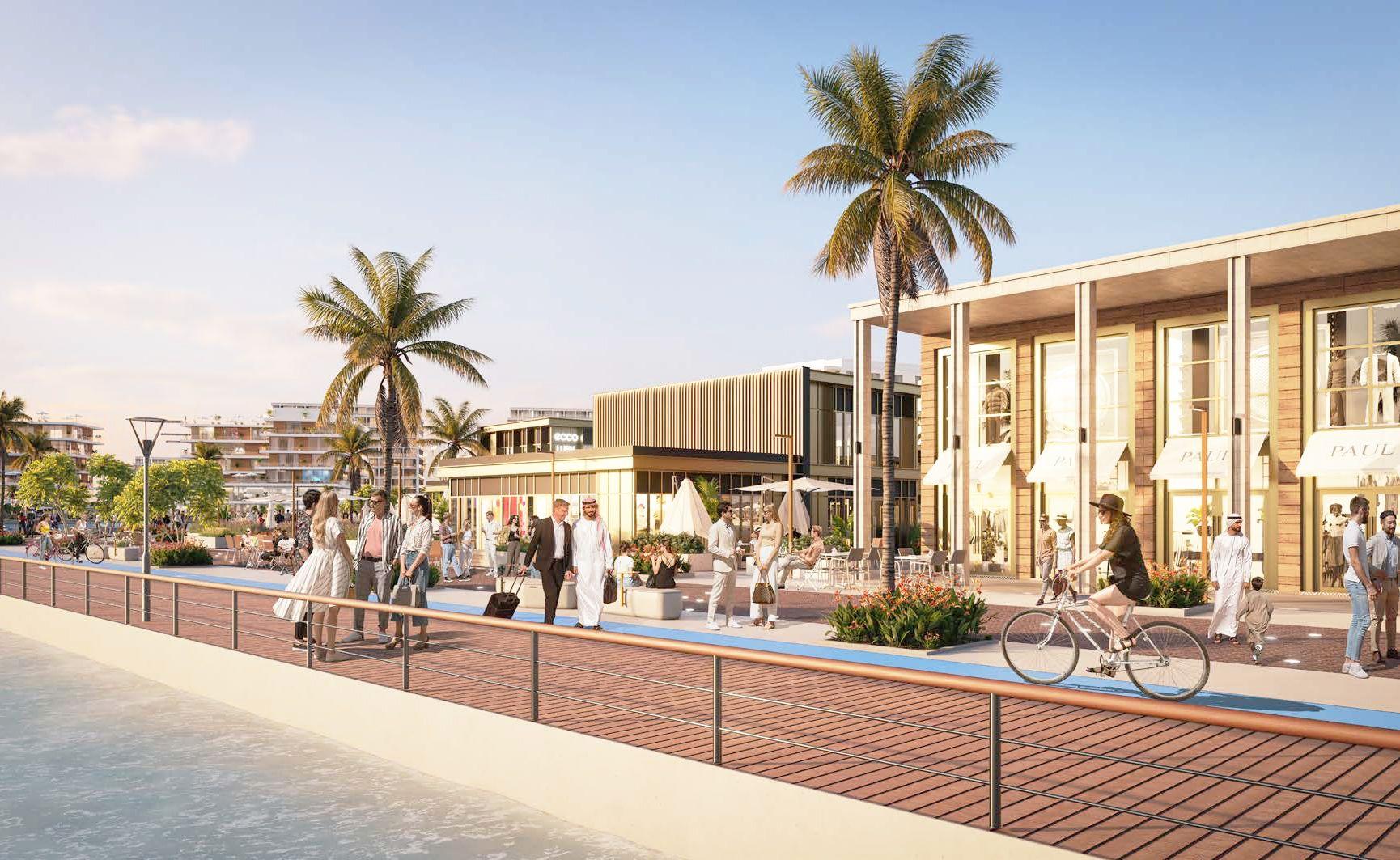 Aerial or ground-level view of Yas Acres North Bay’s masterplanned coastal neighborhood with mixed-use plots, landscaped gardens, and picturesque water views as part of a luxury Abu Dhabi development.